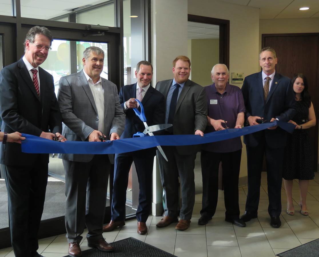 Photo showing ribbon cutting at Winton Road