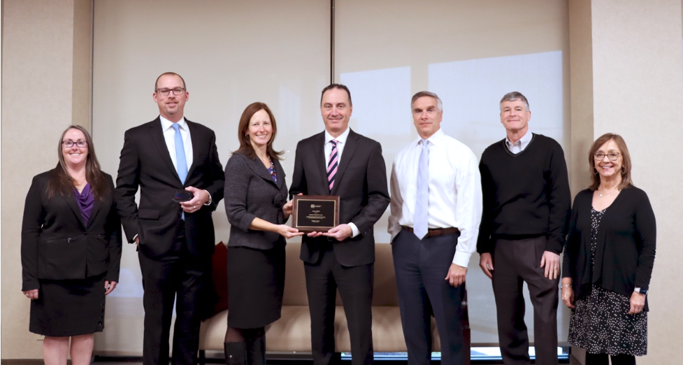 GRB's Commercial lending team accepts the Gold award from the U.S. Small Business Administration