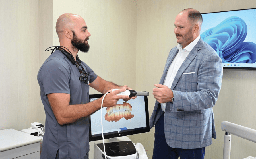 GRB's Professional Practice Team Leader Dave Cushman meets with a dental client to discuss a new equipment purchase.