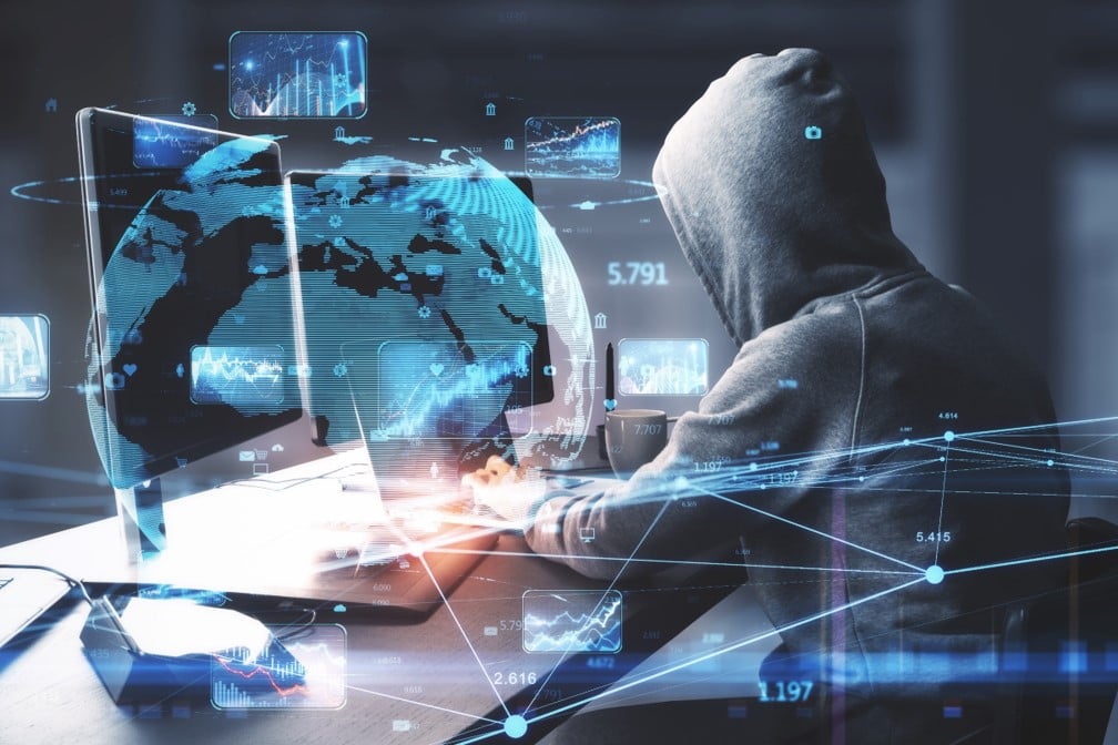 Hacker conducting cyber-attacks on organizations around the world