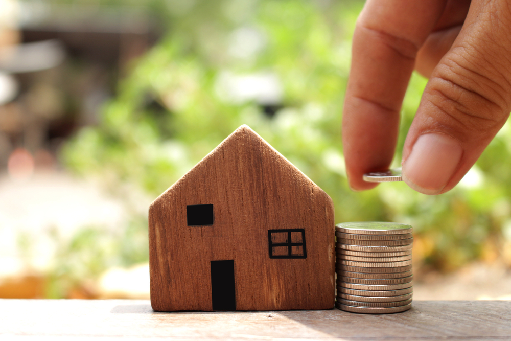 refinance coin stack and house