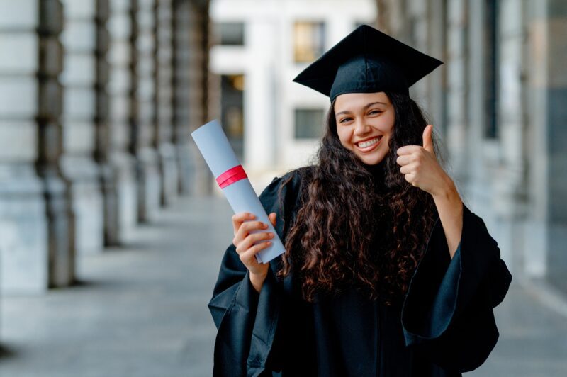 young woman graduating from high school